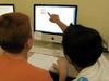 Boys pointing at computer screen with EcoMUVE Project Team Project News EcoMOD in the 2018 STEM for all Video Showcase EcoMUVE and EcoMOBILE featured in articles online ARIS Summit 2015 and GLS