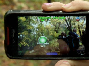 Photo of ecoMOBILE on a mobile device, showcasing the features of augmented reality.